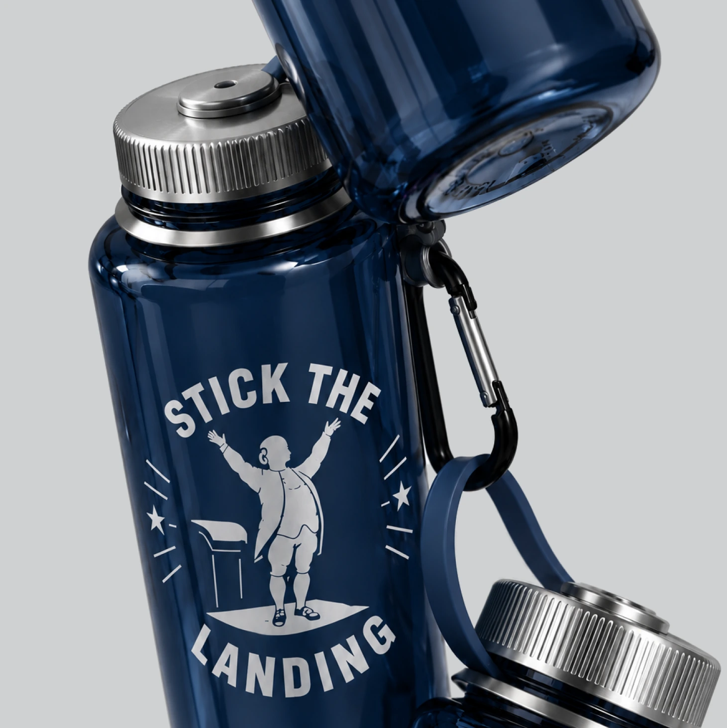 Navy water bottle with the Stick the Landing graphic